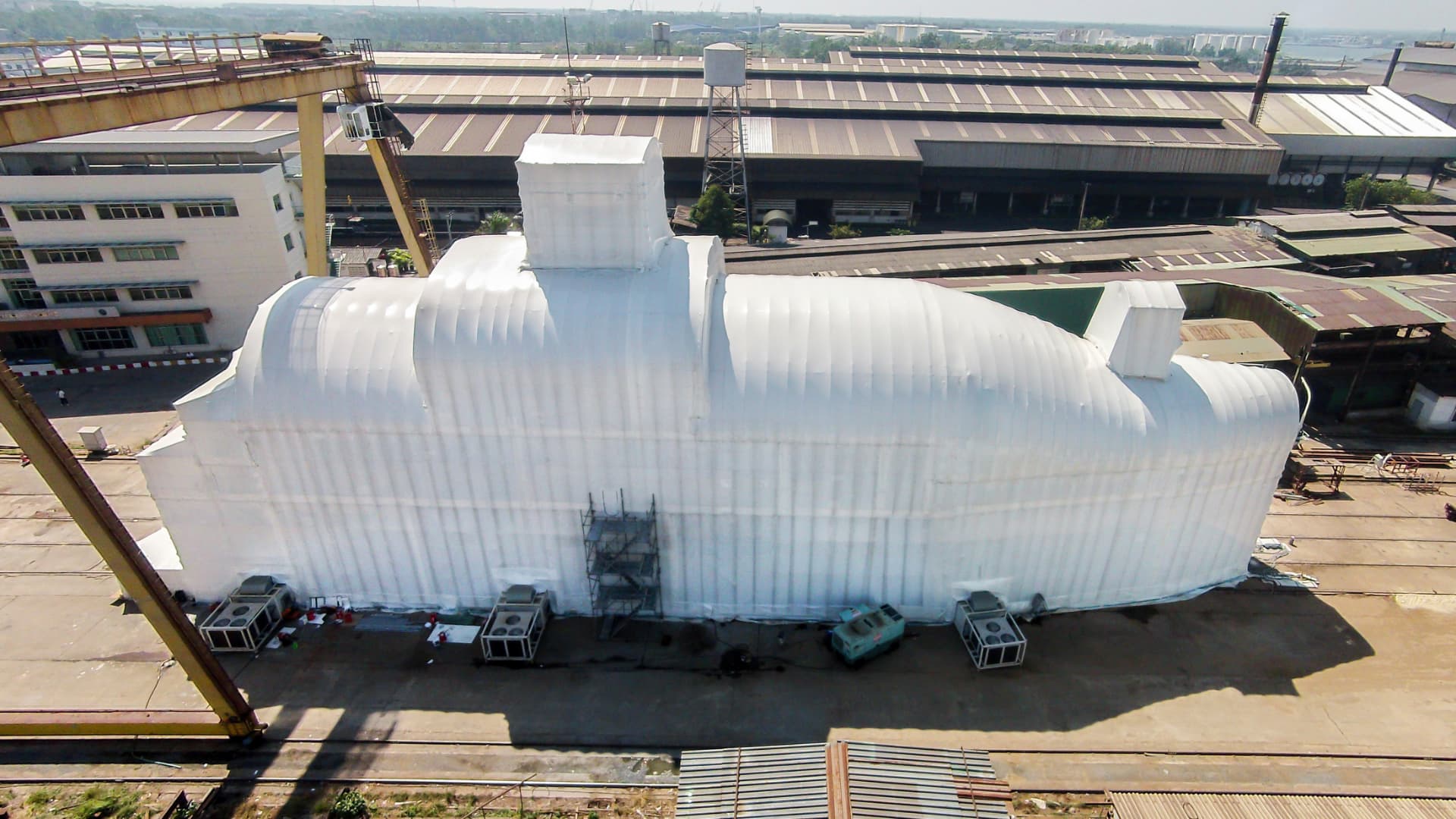 Containment over a superyacht during a refit